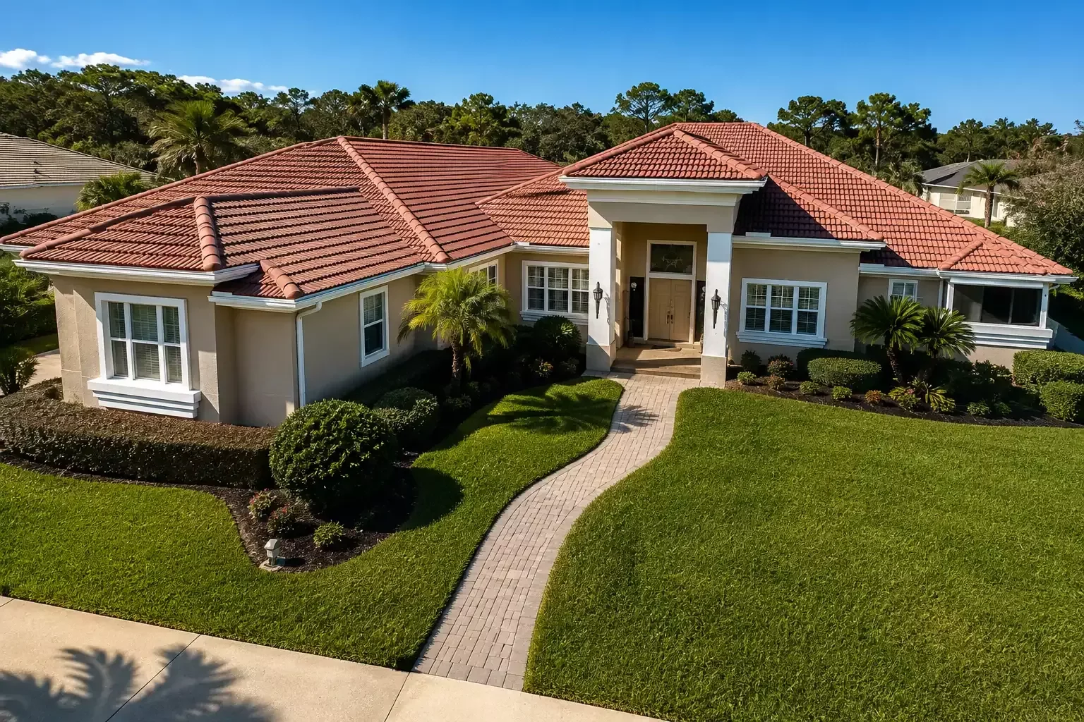 Completed tile roof replacement on a home in Apopka, FL by 4B Roofing & Construction
